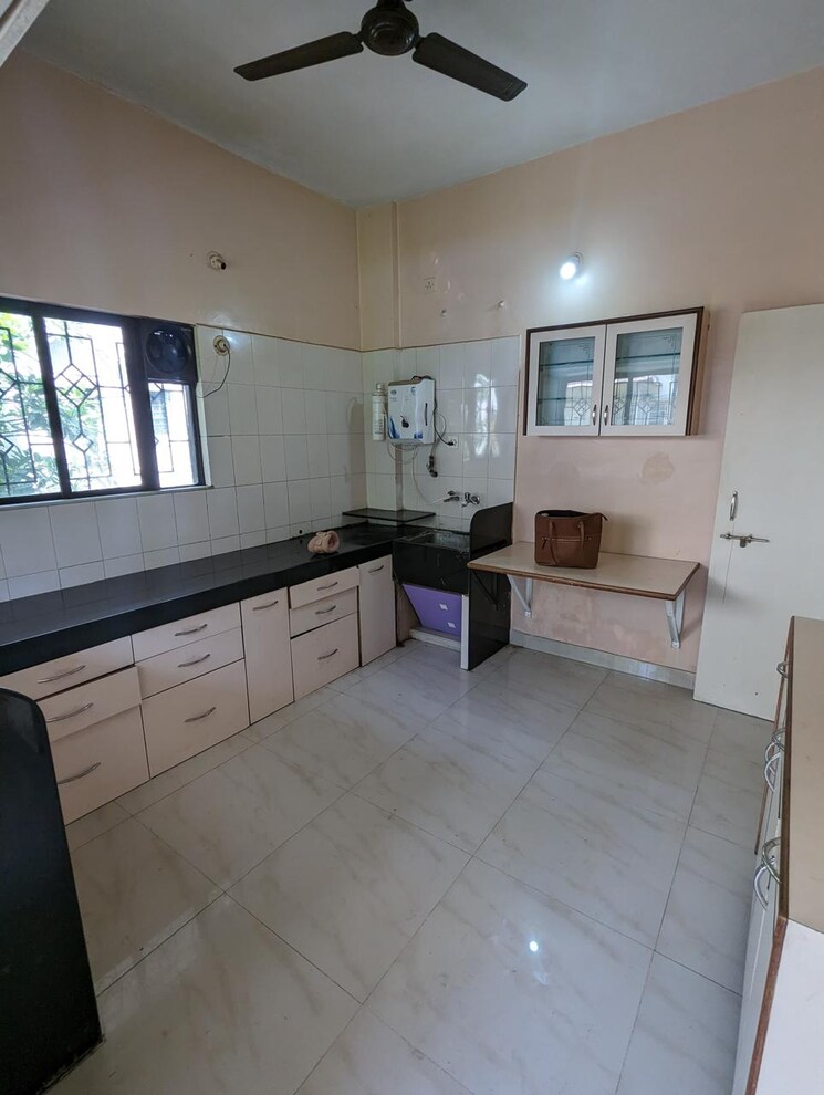 Kitchen, sarala-apartments-model-colony 2 Bedroom 1350 Sq.Ft. Apartment In Model Colony Pune 7953801