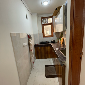 Kitchen in 2 BHK Builder Floor at Khirki Extension – for Rent