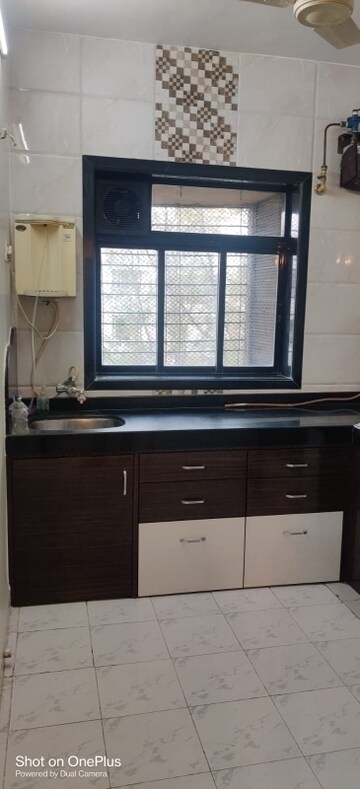 Kitchen in 1 BHK Apartment at Kavya Hill View CHS, Anand Nagar – for Rent