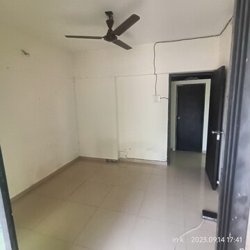 Living Room in 1 BHK Apartment at Maitri Planet NX, Kharghar – for Sale