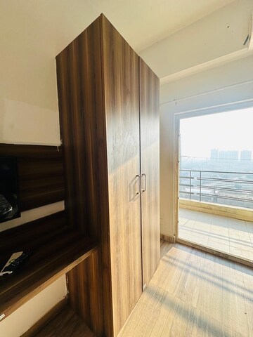 Bedroom in 1 RK Apartment at Paramount Golf Foreste Apartments, Zeta I Greater Noida – for Rent