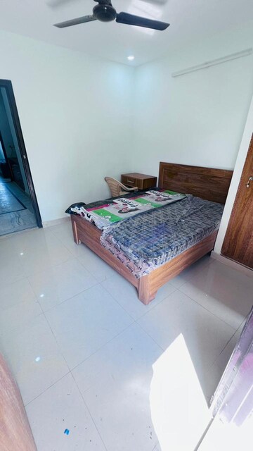Bedroom in 3 BHK Builder Floor at Ansal Sushant Lok I, Sector 43 – for Rent