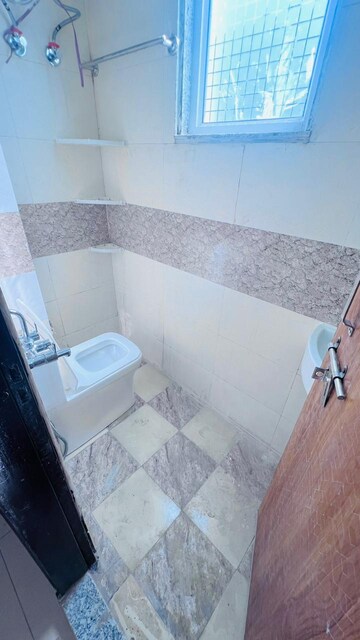 Bathroom in 3 BHK Builder Floor at Ansal Sushant Lok I, Sector 43 – for Rent