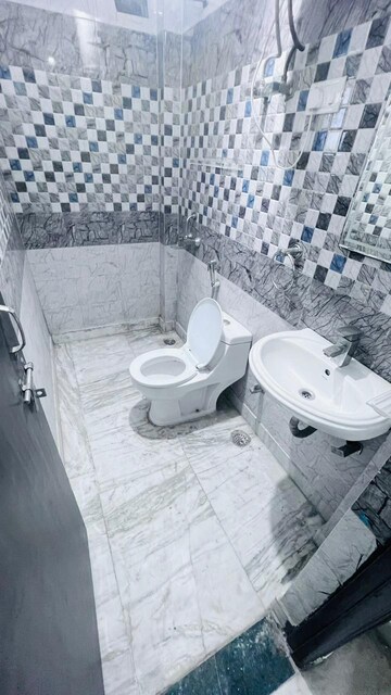 Bathroom in 3 BHK Builder Floor at Ansal Sushant Lok I, Sector 43 – for Rent