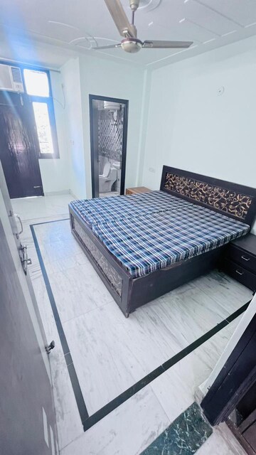 Bedroom in 3 BHK Builder Floor at Ansal Sushant Lok I, Sector 43 – for Rent