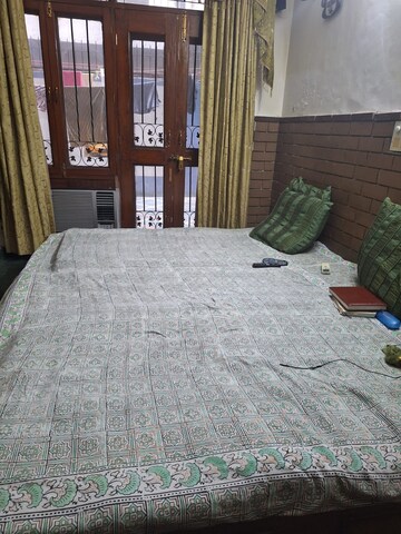 Bedroom in 2 BHK Apartment at Ambience Creacions, Sector 22 – for Rent