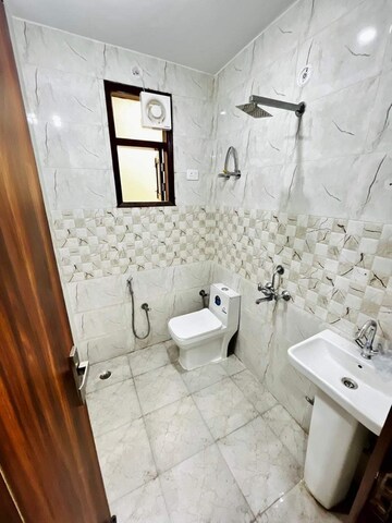 Bathroom in 1 BHK Builder Floor at Chattarpur – for Rent