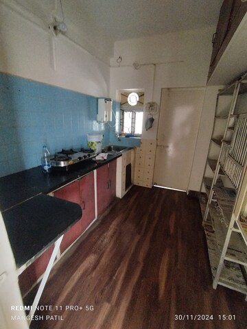 Kitchen in 2 BHK Apartment at Trimurtee Nagar – for Rent