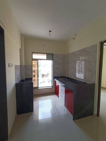 Kitchen in 1 BHK Apartment at Srushti Shri Rajendra Srushti, Palghar – for Sale