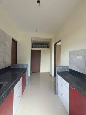 Kitchen in 1 BHK Apartment at Srushti Shri Rajendra Srushti, Palghar – for Sale