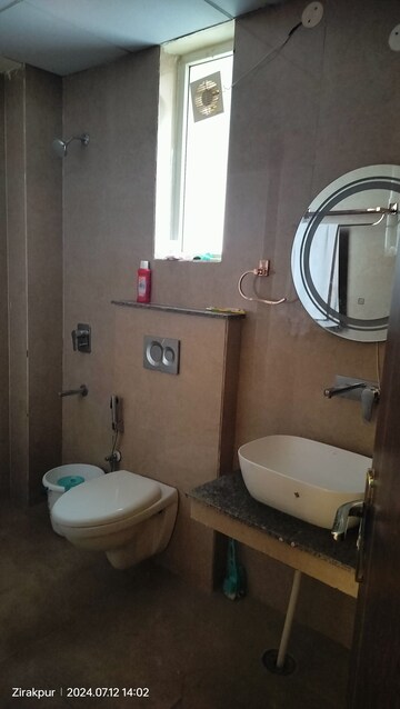 Bathroom in 3 BHK Apartment at Affinity Greens, International Airport Road – for Rent