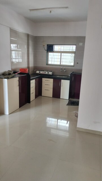 Kitchen in 2 BHK Apartment at Shri Vardhaman Vatika, Thergaon – for Sale