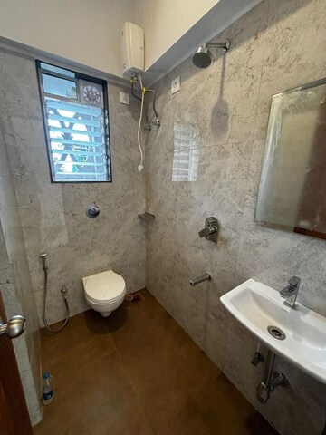 Bathroom in 2 BHK Apartment at Aakash Gagan Dream, Vasai East – for Rent