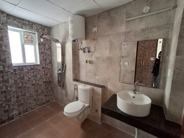 Bathroom in 3 BHK Apartment at Sushma Chandigarh Grande, Lohgarh – for Rent