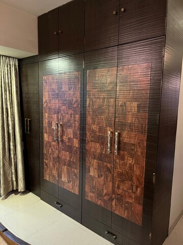 Bedroom in 3 BHK Apartment at Hyde Park CHS, Kharghar – for Rent