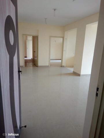 Building Lobby in 2.5 BHK Apartment at RAS Palm Residency, Sector 76 – for Sale