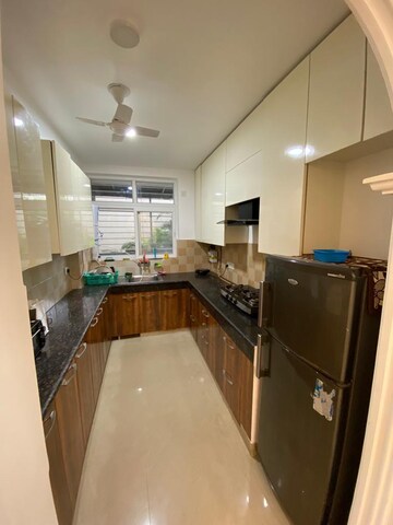 Kitchen in 3 BHK Apartment at 3C Lotus Boulevard, Sector 100 – for Sale