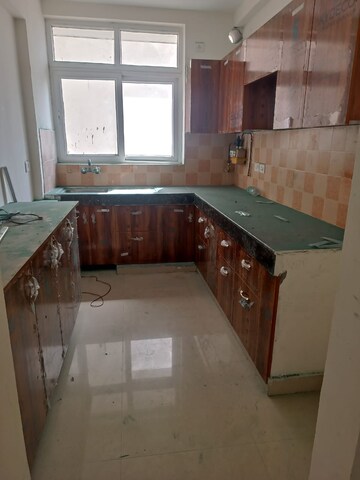 Kitchen in 3 BHK Apartment at Great Value Sharanam, Sector 107 – for Rent