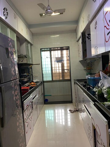 Kitchen in 2.5 BHK Apartment at Oberoi Realty Splendor, Jogeshwari East – for Sale