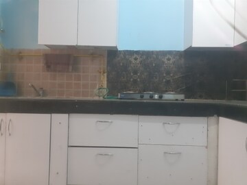 Kitchen in 2 BHK Apartment at Mahagun Mywoods, Sector 16c Greater Noida – for Rent