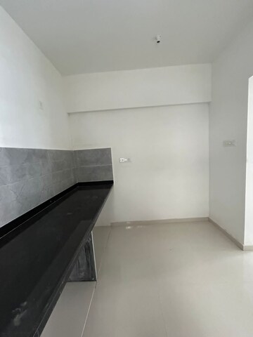 Kitchen in 2 BHK Apartment at Roshan Milestone, Tathawade – for Sale
