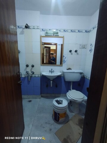 Bathroom in 3 BHK Apartment at Dwarka Mor – for Rent