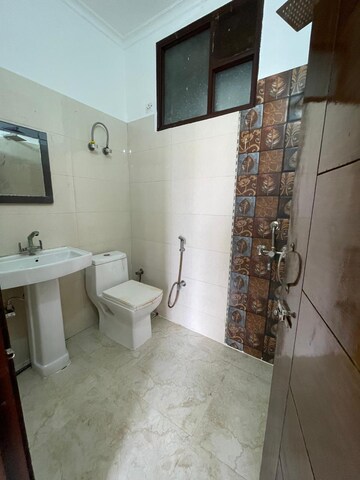Bathroom in 1 BHK Builder Floor at Vasundhara Sector 3 – for Sale