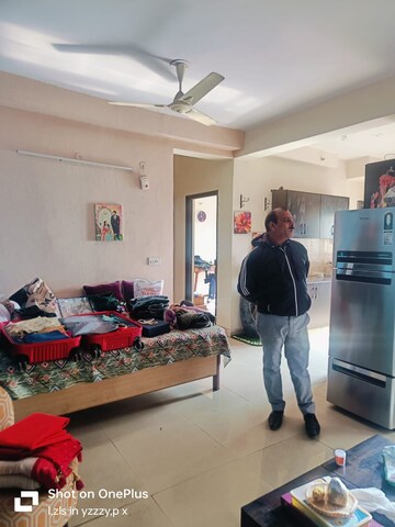 Living Room in 2 BHK Apartment at Aims Golf City, Sector 75 – for Rent