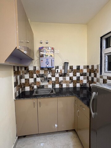 Kitchen in 1 RK Builder Floor at Ansal Sushant Lok I, Sector 43 – for Rent