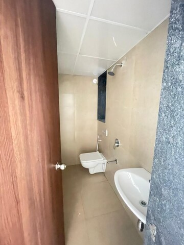 Bathroom in 2 BHK Apartment at Runwal Eirene, Balkum Pada – for Rent