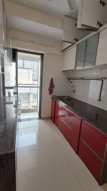 Kitchen in 2 BHK Apartment at Cosmopolis Tower, Andheri West – for Rent