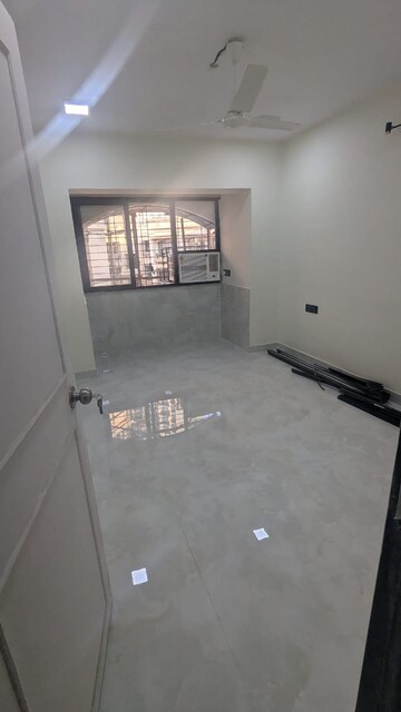Living Room in 2 BHK Apartment at Oakland Park, Andheri West – for Rent