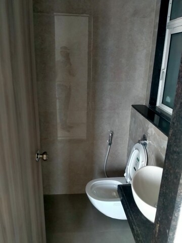 Bathroom in 1 BHK Apartment at Ashar Axis, Majiwada – for Rent