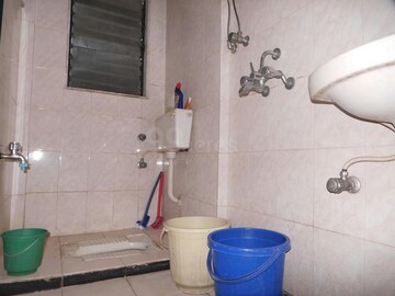 Bathroom in 1 BHK Apartment at AMI Jharna, Goregaon East – for Rent