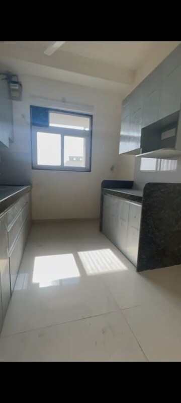 Kitchen in 2 BHK Apartment at Ashar Axis, Majiwada – for Rent