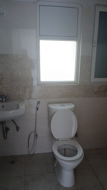 Bathroom in 3 BHK Apartment at Amrapali Golf Homes, Sector 4, Greater Noida – for Rent