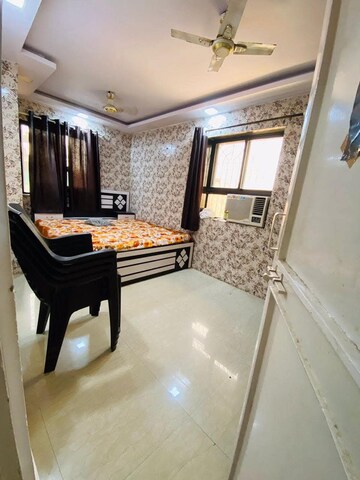 Master Bedroom in 1 BHK Apartment at Spring Leaf 6 CHS, Kandivali East – for Sale