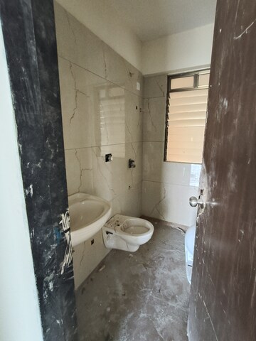 Bathroom in 2 BHK Apartment at Raunak City Sector 4, Kalyan West – for Sale