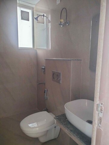 Bathroom in 3 BHK Apartment at Affinity Greens, International Airport Road – for Rent
