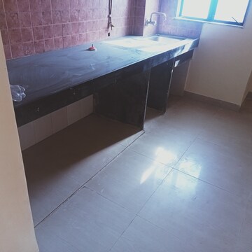 Kitchen in 1 BHK Apartment at Kavya Hill View CHS, Anand Nagar – for Sale