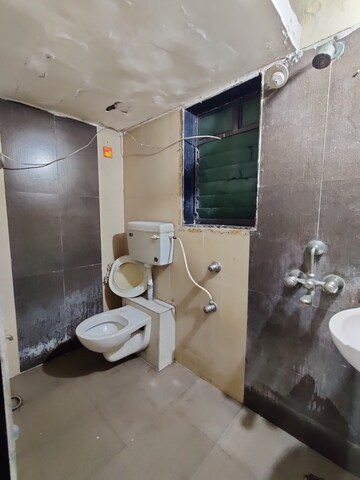 Bathroom in 3 BHK Apartment at Ritu Horizon, Mira Road – for Rent