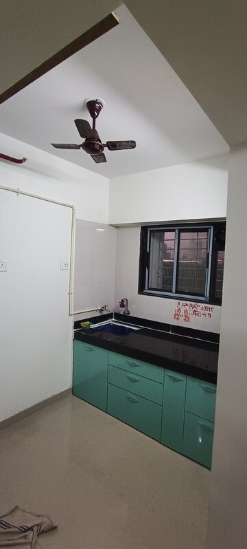 Kitchen in 1 BHK Apartment at Mhada Apartments Shastri Nagar, Goregaon West – for Rent