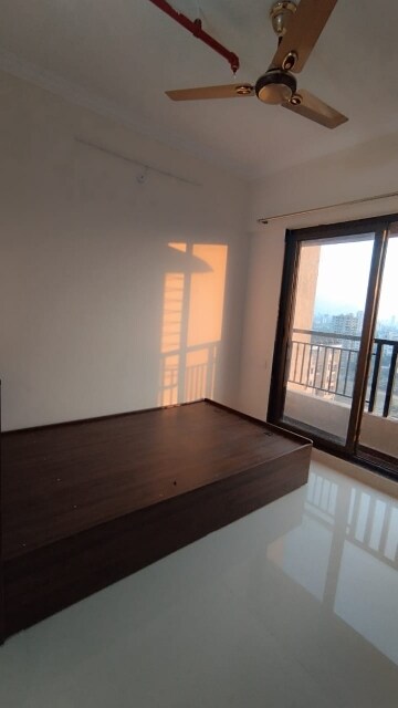 Room in 2 BHK Apartment at Raunak City Sector 4 D8, Kalyan West – for Rent