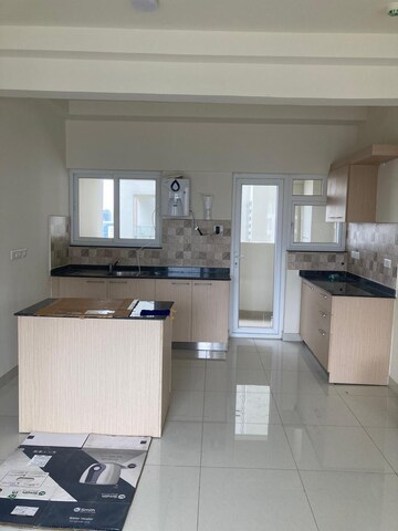 Kitchen in 3 BHK Apartment at Gera World of Joy, Kharadi – for Rent