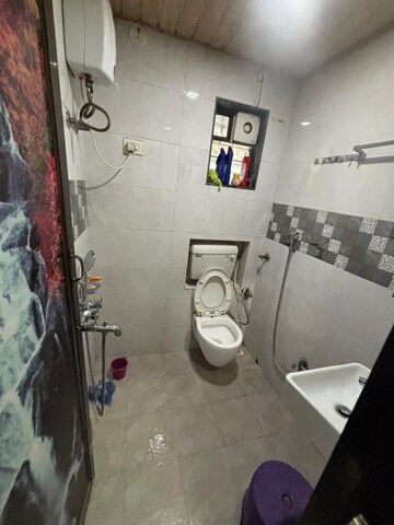 Bathroom in 2 BHK Apartment at Vaibhav Chs Juinagar, Juinagar – for Rent