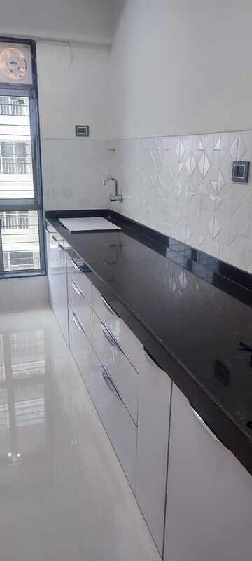 Kitchen in 2 BHK Apartment at Shiv Shakti Tower 28, Malad East – for Rent