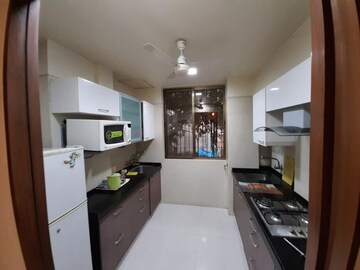 Kitchen in 2 BHK Apartment at Tulip Apartment Santacruz West, Santacruz West – for Rent