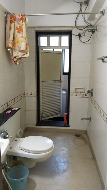 Bathroom in 1 BHK Apartment at K Raheja Heights, Malad East – for Rent