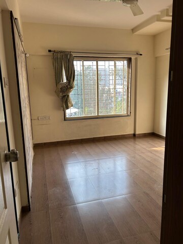 Room in 2 BHK Apartment at Rhythm Society, Wakad – for Rent