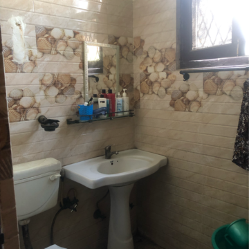 Bathroom in 4 BHK Builder Floor at Raj Nagar Extension – for Sale